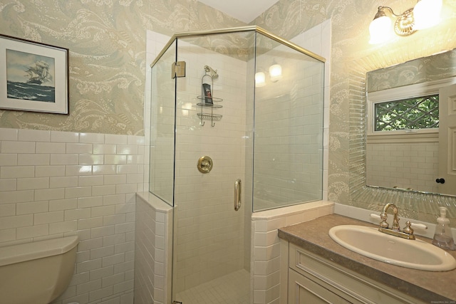27 Country Club Rd, Ridgefield, CT 06877 - full bathroom with wallpapered walls, toilet, a stall shower, wainscoting, and vanity
