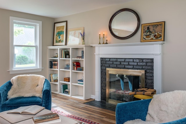 87 Canaan Rd Apt 2F, Salisbury, CT 06068 - living area with a fireplace and wood finished floors