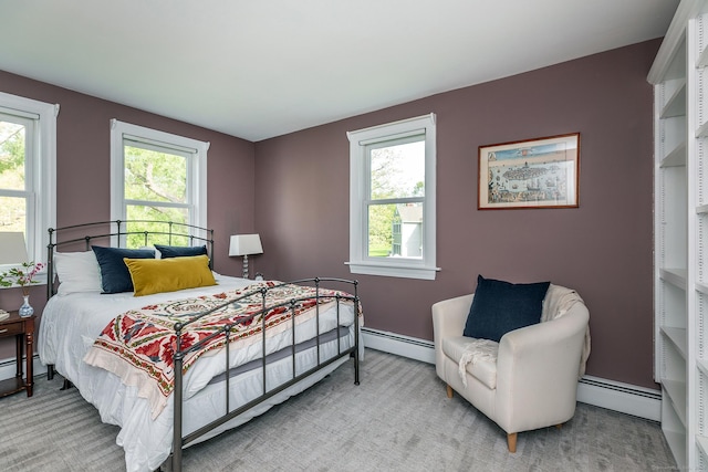 87 Canaan Rd Apt 2F, Salisbury, CT 06068 - bedroom featuring a baseboard heating unit, multiple windows, and carpet floors