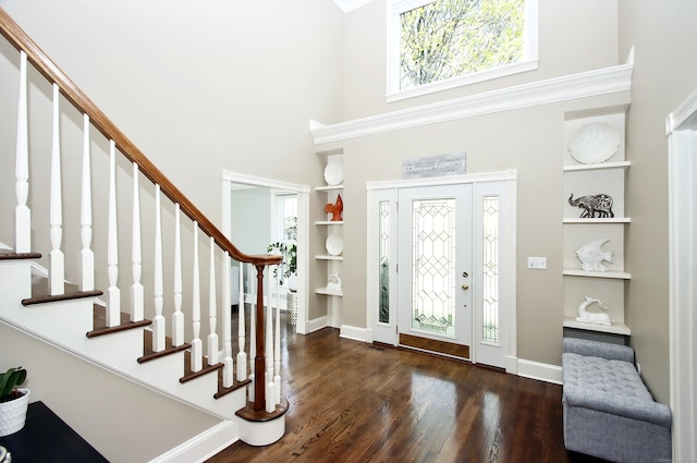56 Grouse Ln, Woodbridge, CT 06525 - foyer featuring a towering ceiling, wood finished floors, stairway, and baseboards
