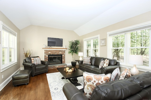 56 Grouse Ln, Woodbridge, CT 06525 - living area featuring vaulted ceiling, dark wood-type flooring, a fireplace, and baseboards