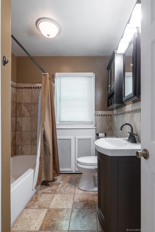 153 Mountain Rd, Cheshire, CT 06410 - bathroom featuring toilet, vanity, shower / tub combo with curtain, tile walls, and radiator heating unit