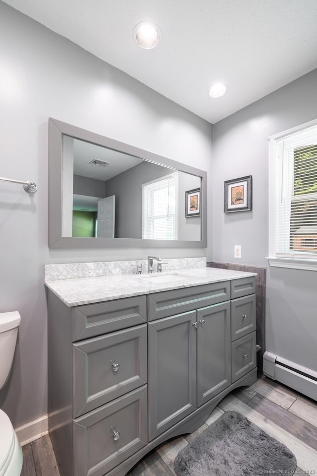 153 Mountain Rd, Cheshire, CT 06410 - bathroom featuring toilet, healthy amount of natural light, and wood finished floors