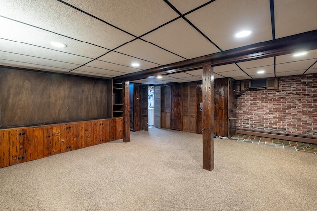 153 Mountain Rd, Cheshire, CT 06410 - finished below grade area with carpet floors, wood walls, brick wall, a paneled ceiling, and recessed lighting