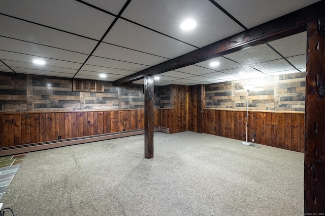 153 Mountain Rd, Cheshire, CT 06410 - finished basement featuring wood walls, baseboard heating, carpet, and a drop ceiling