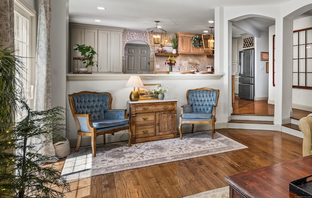 12 Rob Rider Rd, Redding, CT 06896 - sitting room featuring arched walkways, wood finished floors, recessed lighting, and baseboards