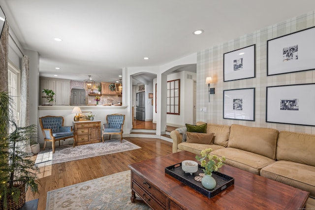 12 Rob Rider Rd, Redding, CT 06896 - living area featuring arched walkways, wood finished floors, and recessed lighting