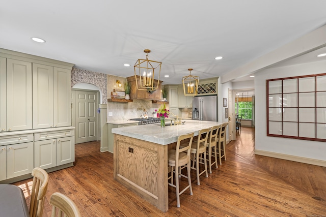 12 Rob Rider Rd, Redding, CT 06896 - kitchen featuring high quality fridge, recessed lighting, dark wood-style flooring, a kitchen breakfast bar, and a chandelier