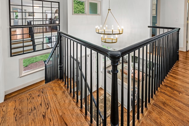 12 Rob Rider Rd, Redding, CT 06896 - stairs featuring a chandelier, wood finished floors, and baseboards