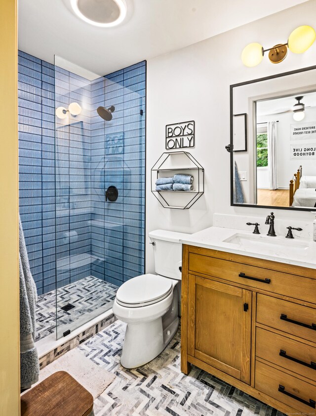 12 Rob Rider Rd, Redding, CT 06896 - bathroom featuring toilet, tiled shower, and vanity