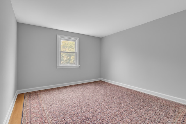 872 Nut Plains Rd, Guilford, CT 06437 - empty room with baseboards and wood finished floors