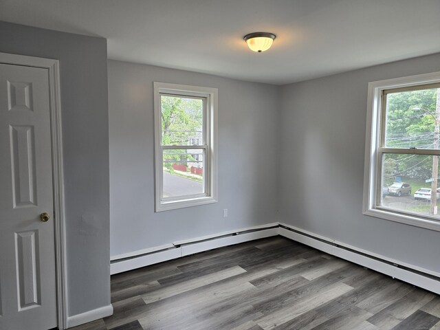 78 Tremont St, New Britain, CT 06051 - spare room featuring plenty of natural light and dark wood finished floors