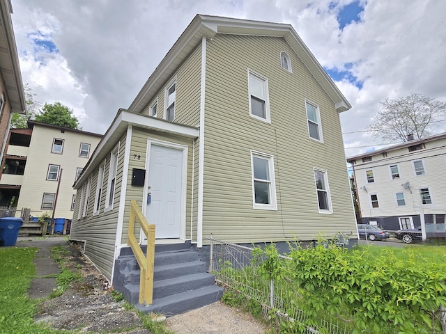78 Tremont St, New Britain, CT 06051 - back of property with fence and entry steps