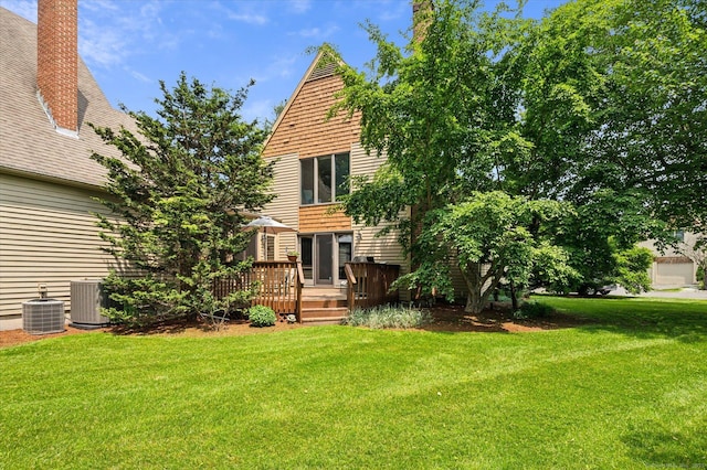 8 Cottonwood Ct Unit 8, Granby, CT 06035 - rear view of property with a wooden deck, a lawn, and cooling unit
