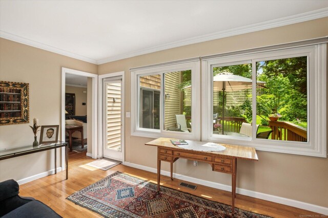 8 Cottonwood Ct Unit 8, Granby, CT 06035 - living room with baseboards, light wood-style flooring, and crown molding