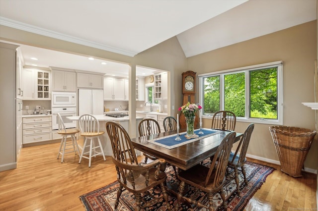 8 Cottonwood Ct Unit 8, Granby, CT 06035 - dining space featuring light wood-style flooring, baseboards, crown molding, lofted ceiling, and recessed lighting