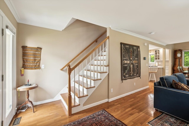 8 Cottonwood Ct Unit 8, Granby, CT 06035 - living area with wood finished floors, stairs, baseboards, and crown molding