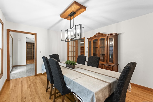 74R Green Ln, Durham, CT 06422 - dining area featuring a chandelier, light wood finished floors, and baseboards
