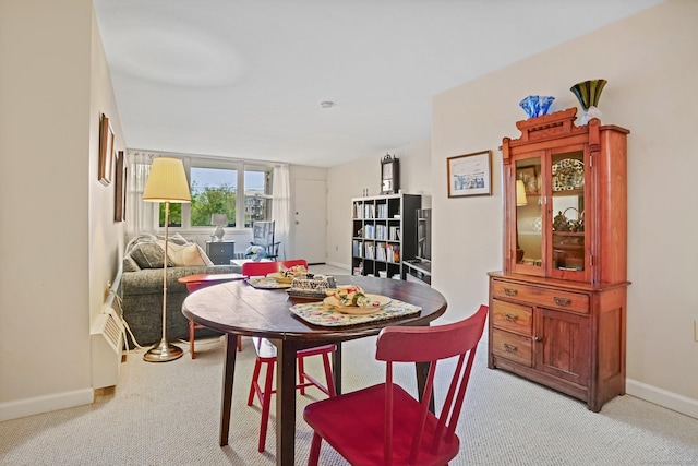 15 Ellsworth St Apt 22, Bridgeport, CT 06605 - dining space featuring light colored carpet and baseboards