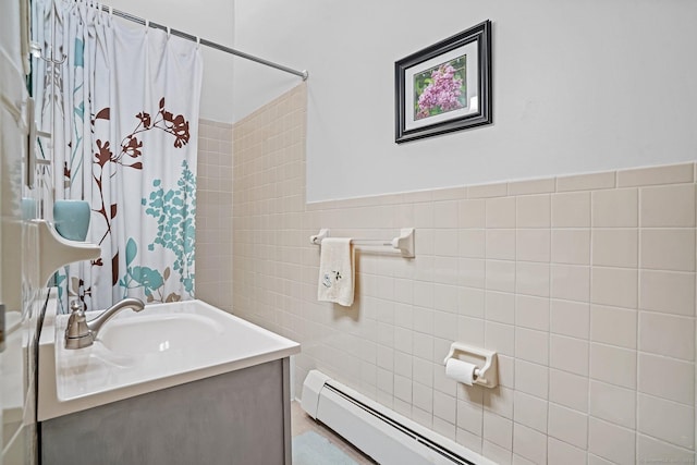 15 Ellsworth St Apt 22, Bridgeport, CT 06605 - bathroom featuring tile walls, vanity, a shower with curtain, and a baseboard heating unit