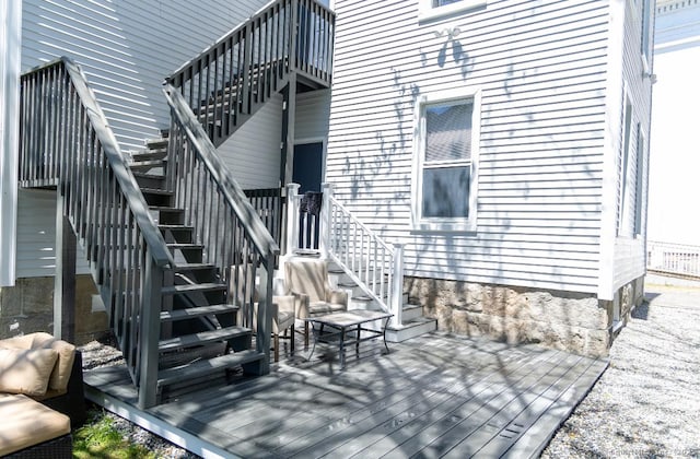 doorway to property with a wooden deck