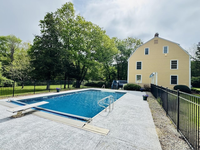 134 School House Rd, Old Saybrook, CT 06475 - view of pool with a patio area, fence, and view of wooded area