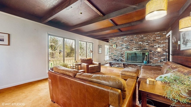 living area with baseboards, a brick fireplace, beam ceiling, and carpet flooring