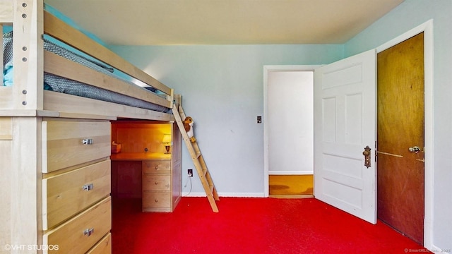 unfurnished bedroom with carpet floors