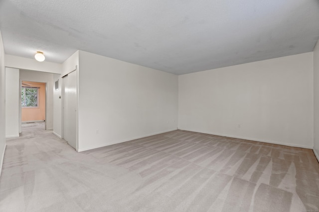 281 Gardner Ave Unit G5, New London, CT 06320 - empty room with light carpet and baseboards