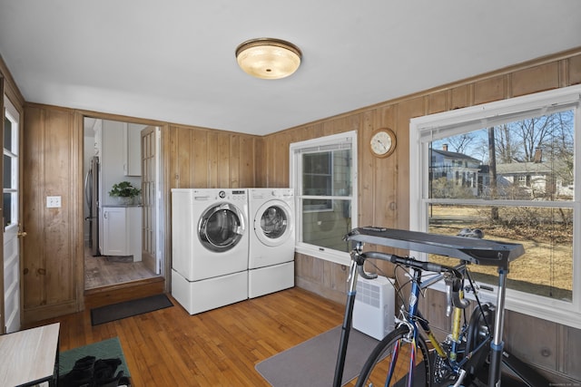 42A New London Rd, Groton, CT 06355 - clothes washing area with washer and clothes dryer, wood walls, and wood finished floors