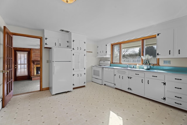 42A New London Rd, Groton, CT 06355 - kitchen with white appliances, plenty of natural light, and white cabinetry
