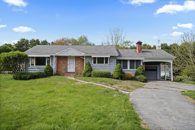 42A New London Rd, Groton, CT 06355 - single story home with a chimney, a front yard, an attached garage, driveway, and roof with shingles
