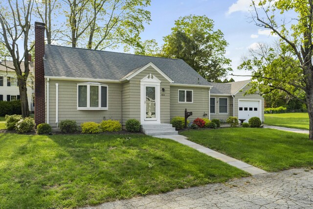 42A New London Rd, Groton, CT 06355 - view of front of house with an attached garage, a front yard, a chimney, and a shingled roof