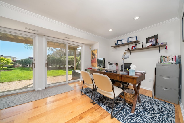 home office with light wood-style flooring, ornamental molding, recessed lighting, and baseboards