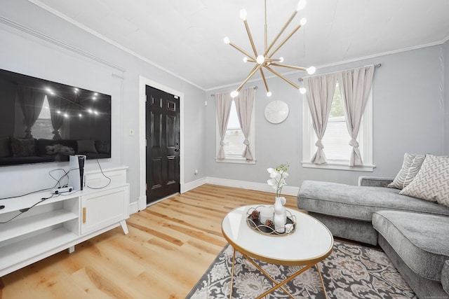 55 Lounsbury Ave, Waterbury, CT 06706 - living room featuring a chandelier, light wood-style flooring, crown molding, and baseboards