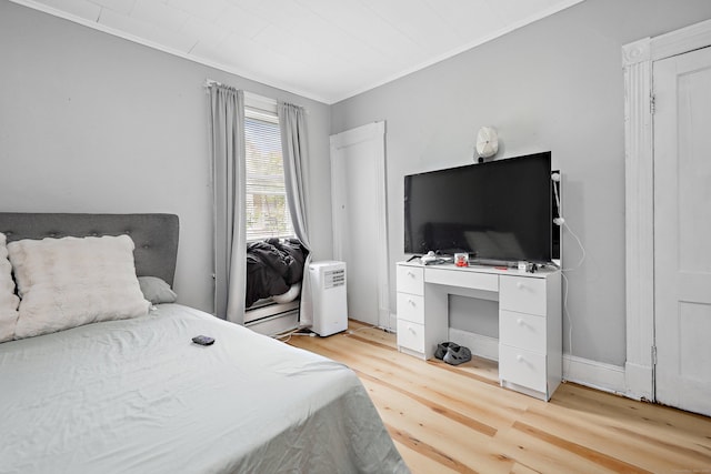 55 Lounsbury Ave, Waterbury, CT 06706 - bedroom with light wood-style flooring and crown molding