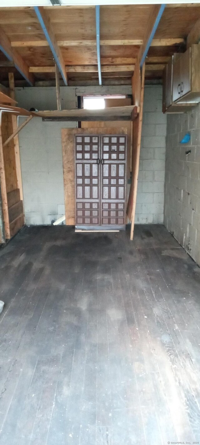 55 Lounsbury Ave, Waterbury, CT 06706 - garage featuring concrete block wall