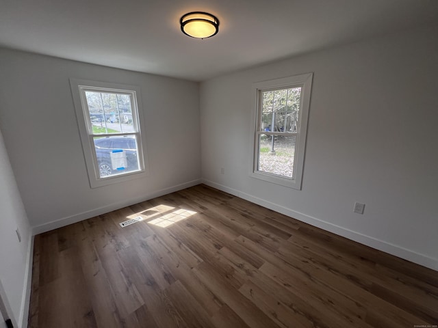 28 Crescent Park Rd, Westport, CT 06880 - spare room with baseboards and wood finished floors