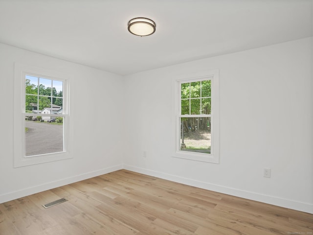 28 Crescent Park Rd, Westport, CT 06880 - unfurnished room with plenty of natural light and light wood-style floors