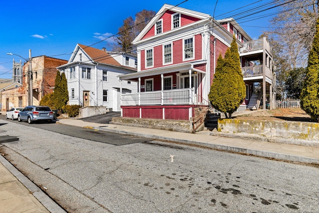 9 Brewer St Unit 1, New London, CT 06320 - view of front of property with a porch and a balcony