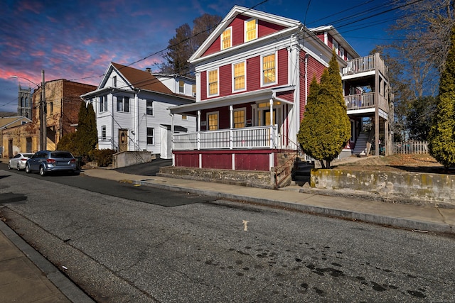9 Brewer St Unit 1, New London, CT 06320 - view of front of house featuring covered porch and a balcony