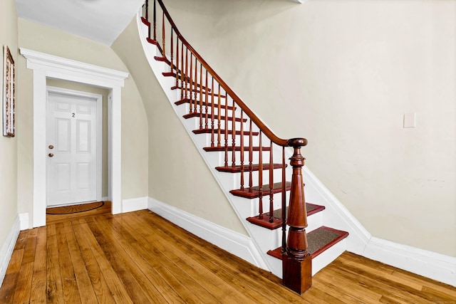 9 Brewer St Unit 1, New London, CT 06320 - stairway featuring wood-type flooring and baseboards