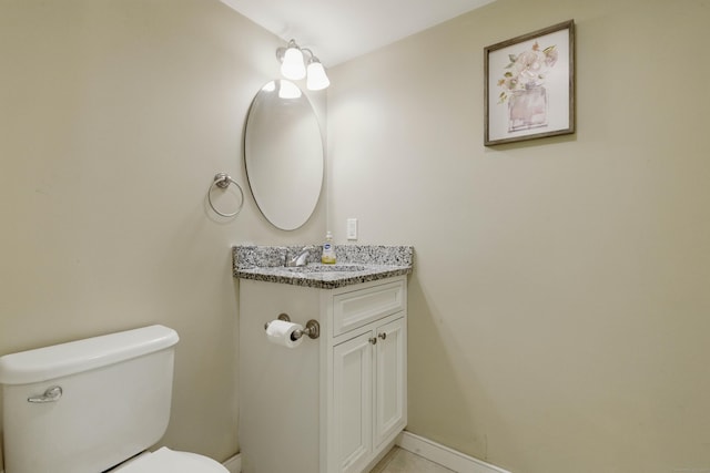 9 Brewer St Unit 1, New London, CT 06320 - bathroom with vanity, toilet, and baseboards