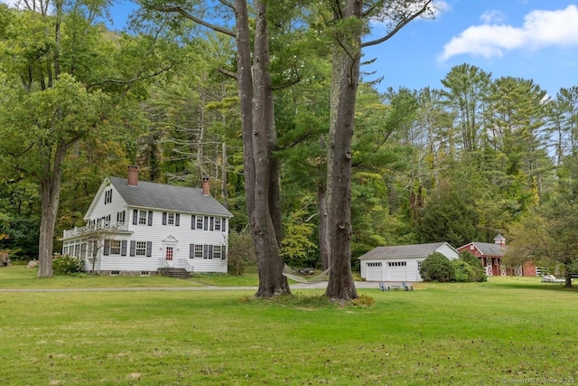 21 Rte 7, Salisbury, CT 06796 - view of front of home with a chimney, a front lawn, and a detached garage