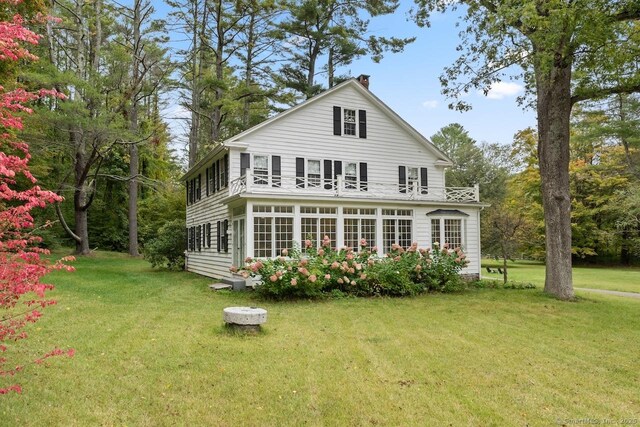 21 Rte 7, Salisbury, CT 06796 - back of property with a chimney and a yard