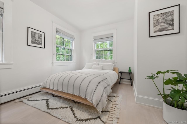 21 Rte 7, Salisbury, CT 06796 - bedroom with light wood-type flooring, a baseboard heating unit, and baseboards