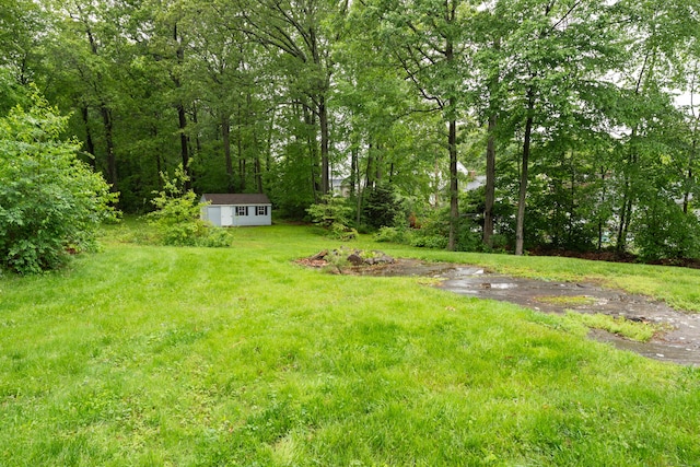 255 Back Ln, Newington, CT 06111 - view of grassy yard with an outdoor structure