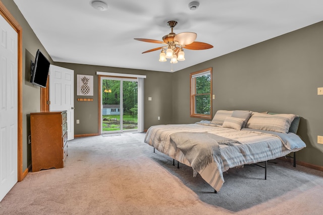 255 Back Ln, Newington, CT 06111 - carpeted bedroom with access to outside, baseboards, and ceiling fan