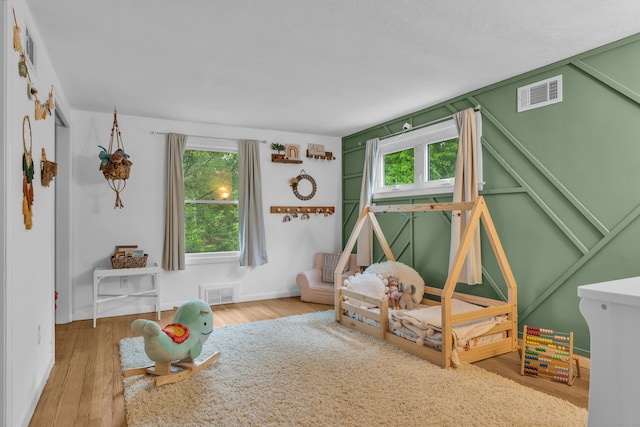 255 Back Ln, Newington, CT 06111 - rec room featuring plenty of natural light, wood finished floors, and baseboards