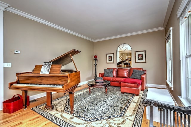 2 Butternut Ridge Rd, Oxford, CT 06478 - living room with wood finished floors, baseboards, ornamental molding, and plenty of natural light